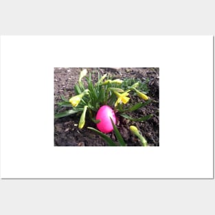 Easter egg in the flowerbed Posters and Art